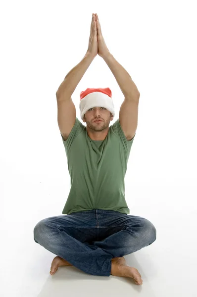 Orando homem com Papai Noel cap — Fotografia de Stock