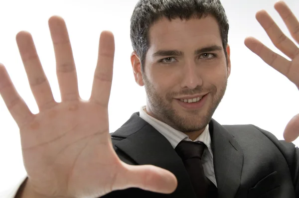 Mladý muž s rukou gesto — Stock fotografie