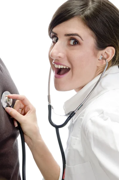 Signora sorridente con stetoscopio — Foto Stock