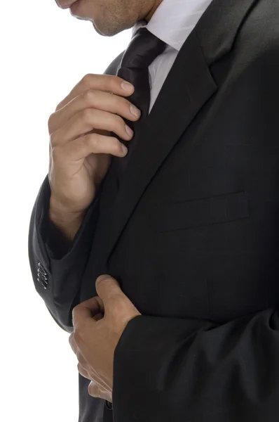 Dorosły człowiek mocowania krawat — Zdjęcie stockowe