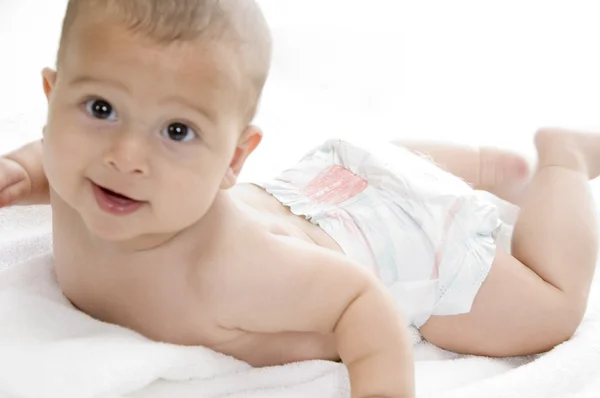 Раздевание младенцев на камеру — стоковое фото