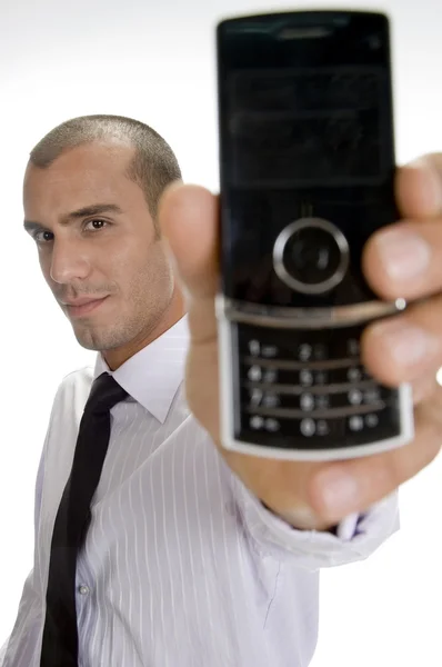 Ung affärsman håller mobil — Stockfoto
