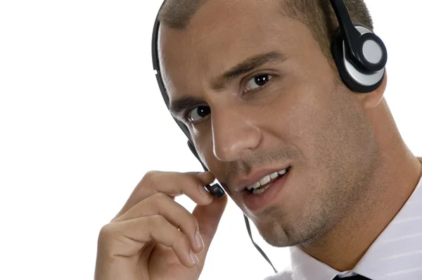 Hombre de negocios sosteniendo altavoz auricular —  Fotos de Stock
