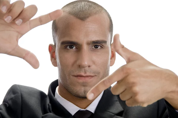 Businessman making a frame gesture — Stock Photo, Image