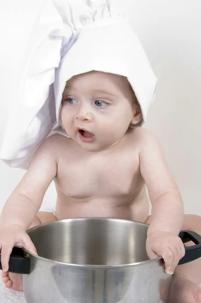 Little cute baby chef holding pan — Stock Photo, Image