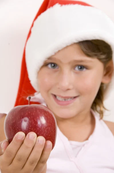 Cute dziewczynka trzymając jabłko — Zdjęcie stockowe