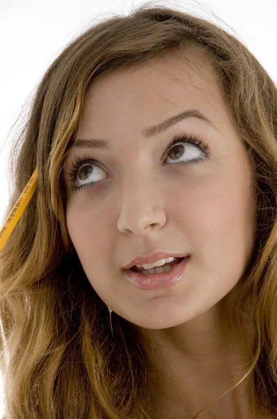 Close up of school girl with pencil — Stock Photo, Image