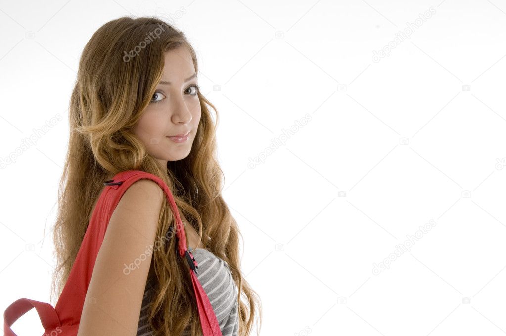 Female student posing with school bag
