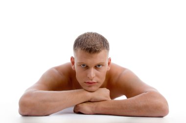 Muscular shirtless male looking at you clipart