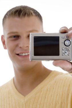 Happy man holding digital camera clipart