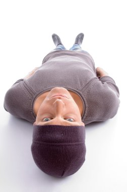 Man lying on his back, looking at camera clipart