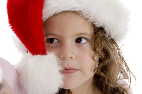 Χαριτωμένο μικρό κορίτσι που φοράει καπέλο Χριστούγεννα — Φωτογραφία Αρχείου