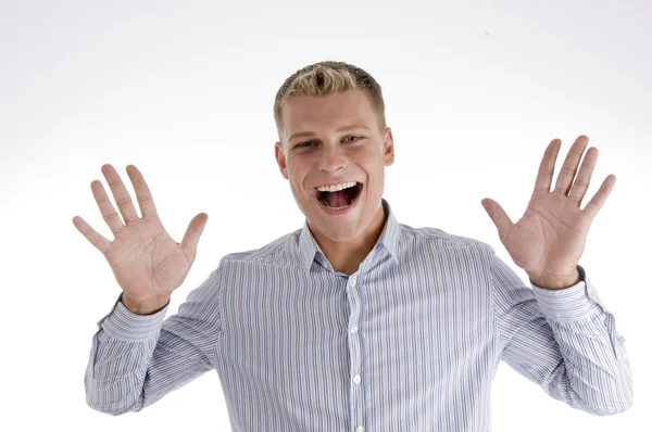 Happy young man with open palms — Stock Photo, Image