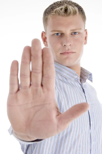Young man instructing to stop — Stock Photo, Image