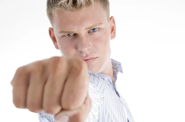Jovem do sexo masculino mostrando seu punho — Fotografia de Stock