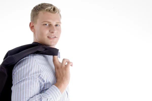 Empresário segurando seu casaco no ombro — Fotografia de Stock