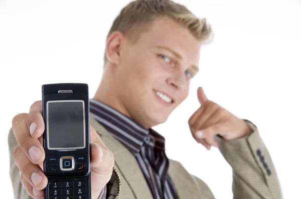 Homem mostrando seu celular, gesticulando — Fotografia de Stock