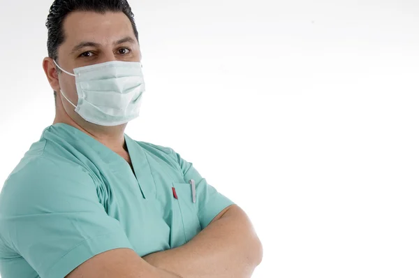 Läkare poserar med ansiktsmask på — Stockfoto