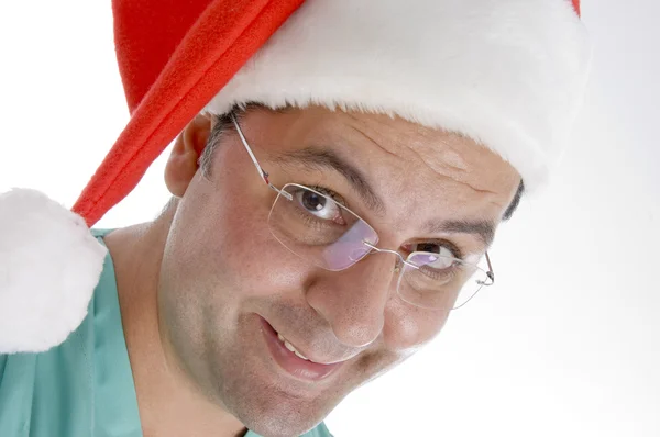 Doktor giyen Noel şapka — Stok fotoğraf
