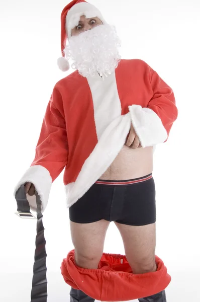 Babbo Natale che tiene il cappotto e la cintura — Foto Stock