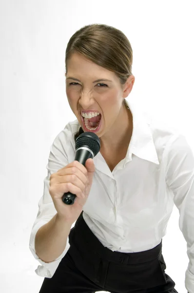 Zakenvrouw zingen in microfoon — Stockfoto
