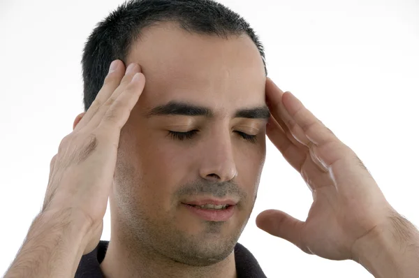 Mladý muž s bolestí hlavy, v napětí — Stock fotografie