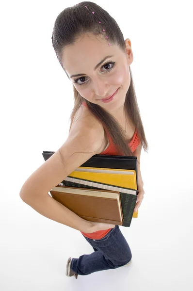 Mladá dívka s knihami, ariel zobrazení — Stock fotografie