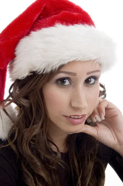 Close up of woman wearing christmas hat — Stock Photo, Image