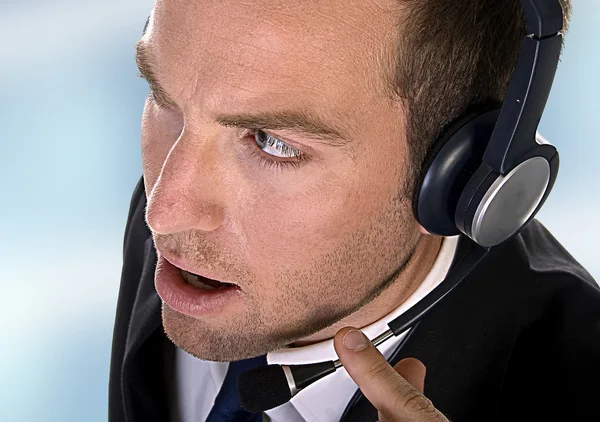 Young businessman with headphones — Stock Photo, Image
