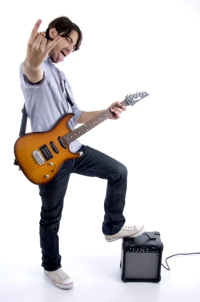 抱着吉他的年轻的摇滚明星 — 图库照片