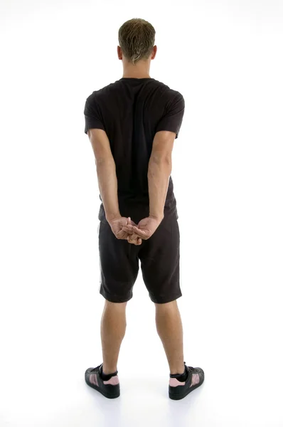 Postura traseira de homem muscular jovem — Fotografia de Stock