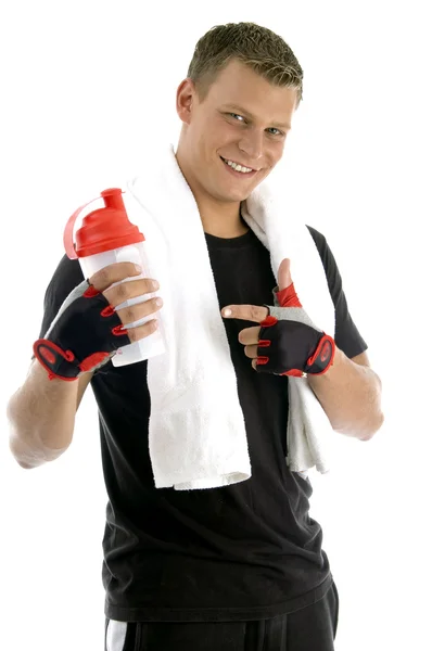 Hombre sano en forma posando con botella —  Fotos de Stock