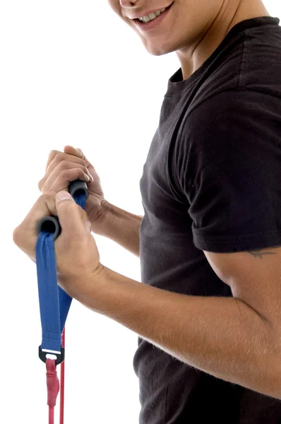 Young man holding exercising rope — Stock Photo, Image