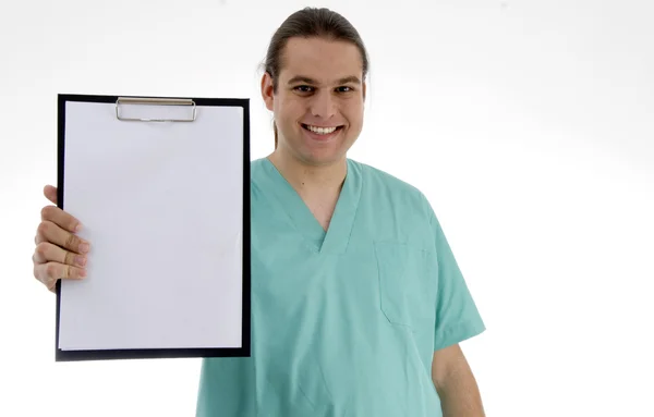 Homme médecin montrant son bloc-notes — Photo