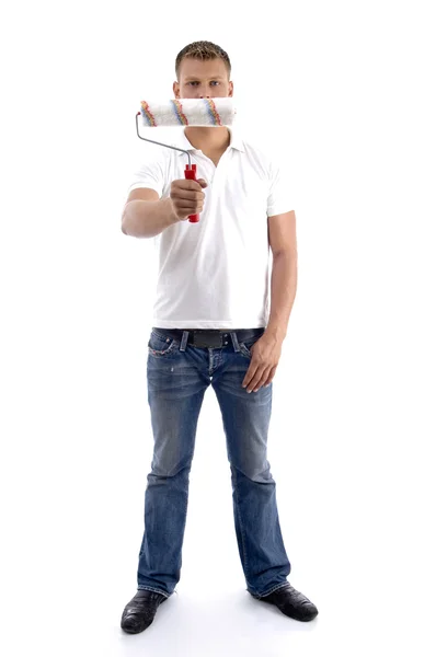 Young guy holding painting brush — Stock Photo, Image