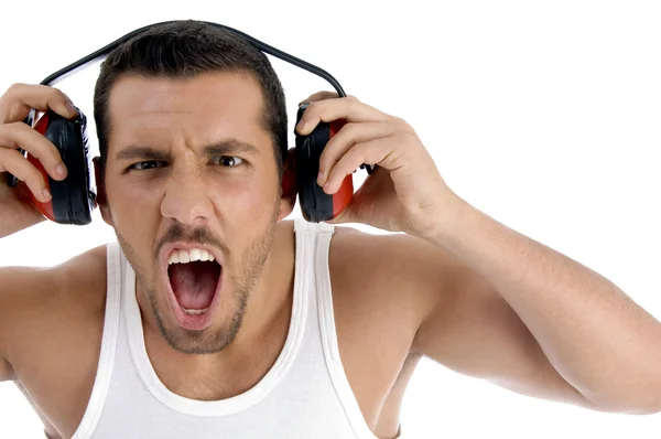 Caucasian guy enjoying rock music — Stock Photo, Image
