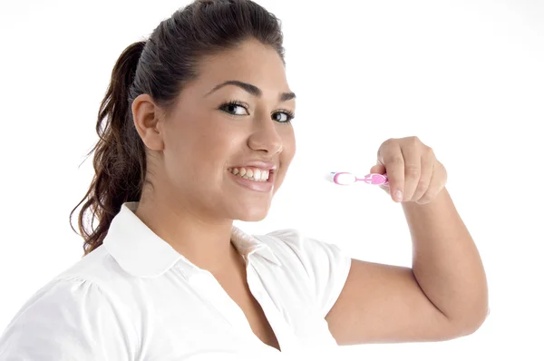 Chica joven limpiando sus dientes —  Fotos de Stock