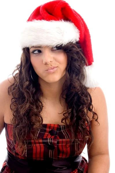 Femme avec chapeau de Noël faisant des visages — Photo