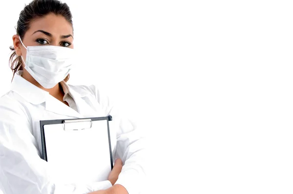 Médico con máscara y tablero de escritura — Foto de Stock