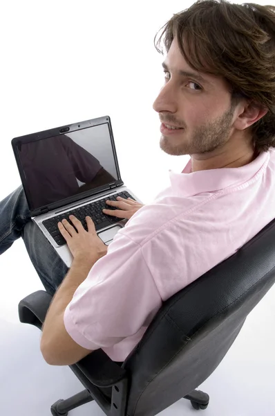 Side view of man with laptop, working — Stock Photo, Image