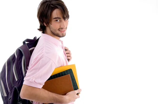 Przystojny student z książek i torba — Zdjęcie stockowe
