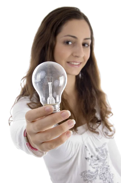 stock image Young female showing light bulb