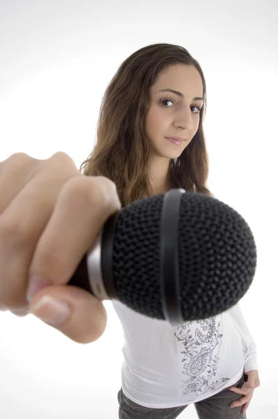 Young female holding microphone — Stock Photo, Image