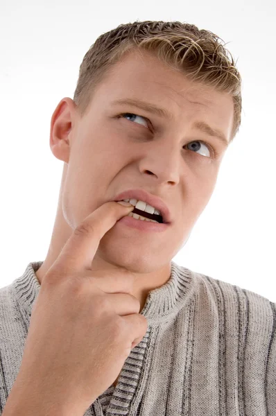 Σκεπτόμενο άνθρωπο βάζοντας το δάχτυλο στο στόμα — Φωτογραφία Αρχείου