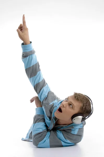 Mladý muž se sluchátky hudebně — Stock fotografie