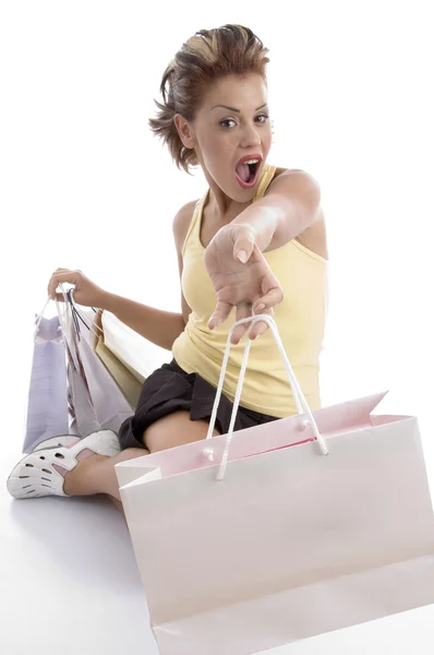 Sexy woman showing shopping bags — Stock Photo, Image