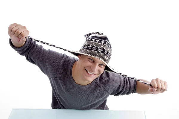Portrait of smiling man in winter cap — Stock Photo, Image