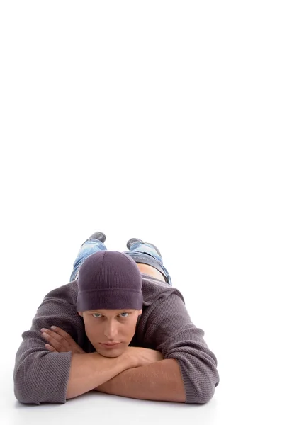 Giovane uomo americano sdraiato sul pavimento — Foto Stock