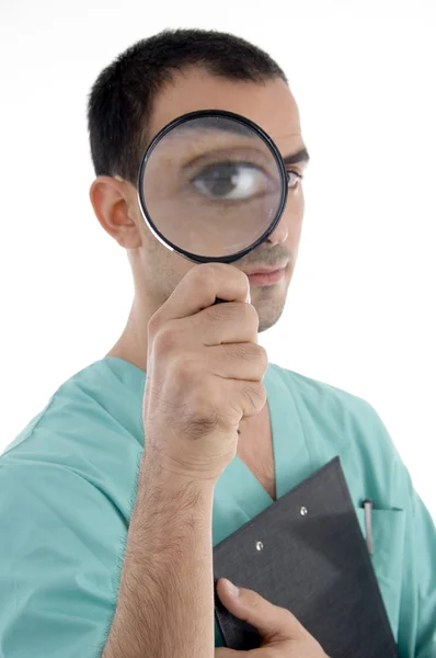 智能的外科医生举行放大镜 — 图库照片