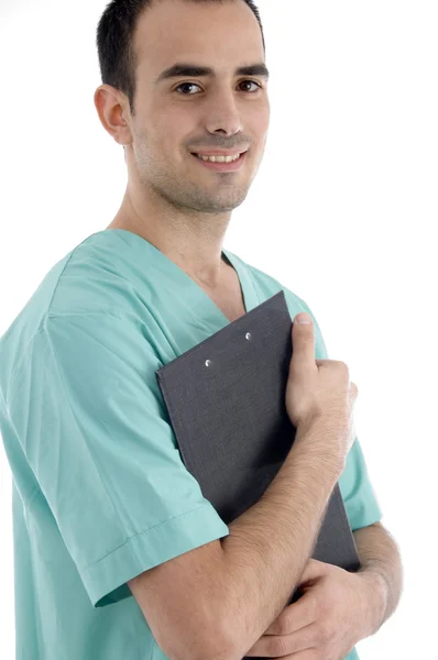 Jovem cirurgião masculino com almofada de escrita — Fotografia de Stock